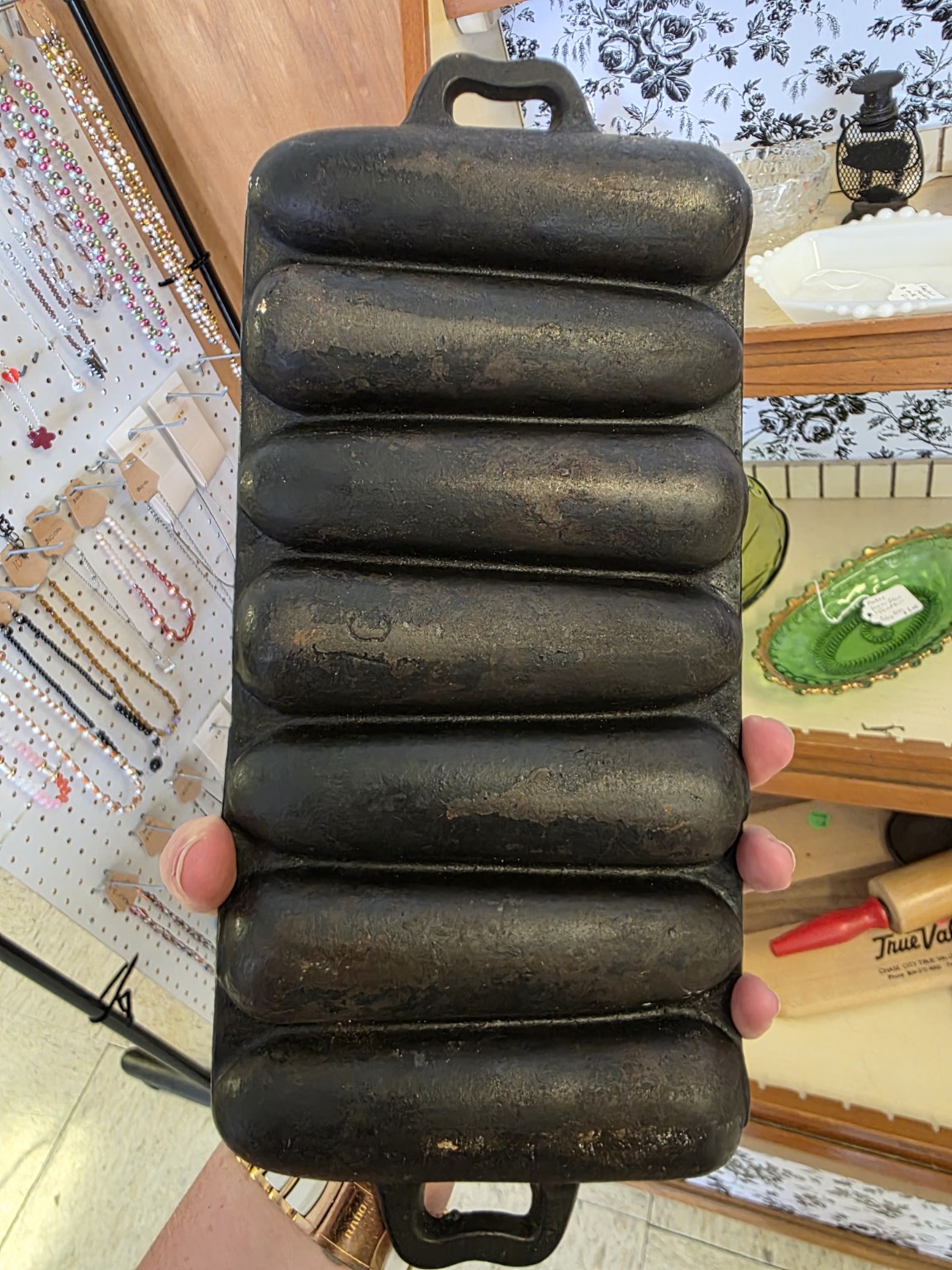 Underside of a seven-stick BSR cast-iron corn pan